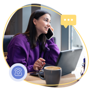 Woman on phone with laptop